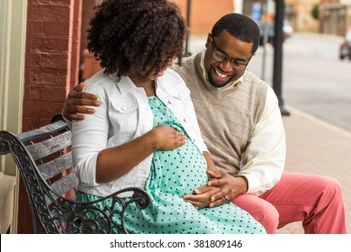 African American Pregnant Woman Outside.