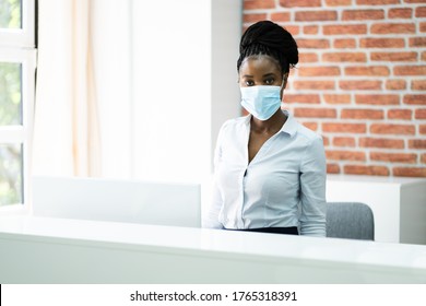 African American Reception Desk Woman Wearing Mask