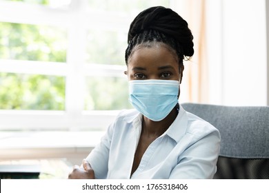 African American Reception Desk Woman Wearing Mask