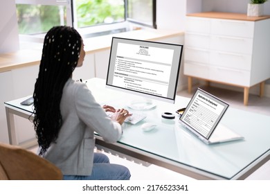 African American Resume CV Preparation On Laptop Computer