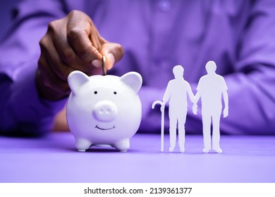 African American Saving In Piggy Bank For Retirement - Shutterstock ID 2139361377