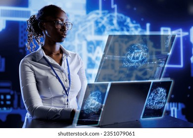 African american scientist using cognitive computing simulating human brain thought processes in computerized model. AI machine visualization showing deep learning algorithms using pattern recognition