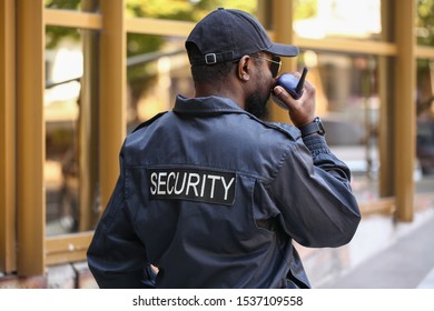 African - American security guard outdoors - Powered by Shutterstock