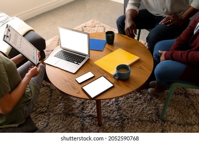 African American Senior Couple Meeting With Asian Financial Advisor Using Laptop With Copy Space. Retirement Lifestyle, Elderly Support And Spending Time At Home.