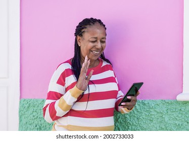 African American Senior Woman Doing Video Call With Smartphone - Happy Elderly Black Person Enjoy Technology