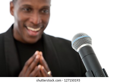 African American Singer Standing On A White Background