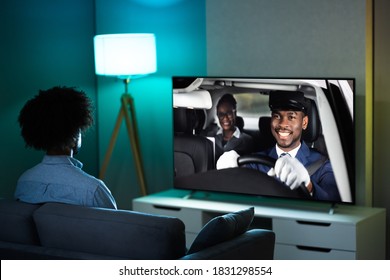 African American Streaming And Watching Movie On TV Screen