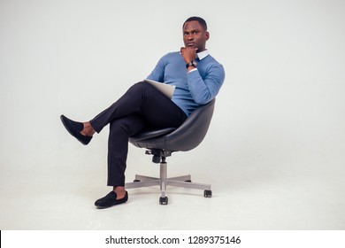 African American Stylish Business Man At The Workspace Office On White Background In Studio Shot