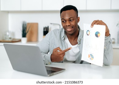 African American Successful Attractive Man, Freelancer, Mentor Or Corporate Financial Advisor, Communicates With Partners Via Video Call, Shows Graph, Discusses Strategy, Negotiates,work From Home