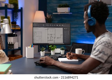 African American Technical Architect Analyzing Real Estate Blueprints Designing Building Prototype Working Remote From Home. Contractor Young Adult Developing Architectural Product