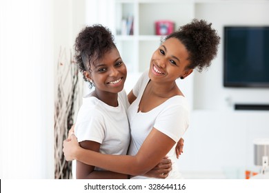 African American Teeange Best Friends Portrait Hugging - Black People