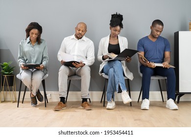 African American Unemployed Job Applicants Waiting In Line