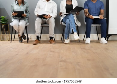 African American Unemployed Job Applicants Waiting In Line