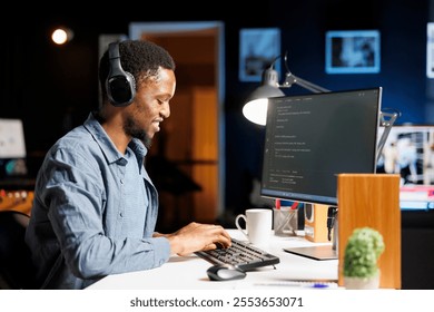 African american web developer coding server scripts on pc, using binary code and programming language on terminal window. Young system administrator debugging database security. - Powered by Shutterstock - Get 15% off with code: PIKWIZARD15