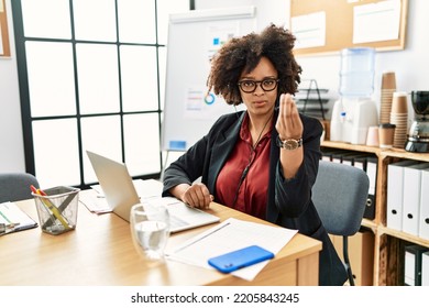 African American Woman With Afro Hair Working At The Office Wearing Operator Headset Doing Italian Gesture With Hand And Fingers Confident Expression 