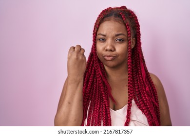 African American Woman With Braided Hair Standing Over Pink Background Doing Italian Gesture With Hand And Fingers Confident Expression 