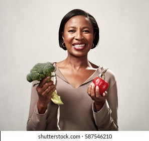 African American Woman With Broccoli