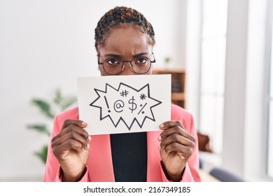 African American Woman Business Worker Holding Insult Banner At Office