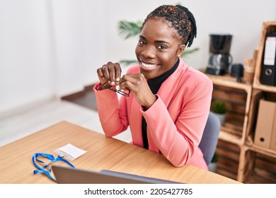 African american woman business worker using laptop working at office - Powered by Shutterstock