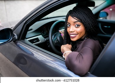 African American Woman In Car