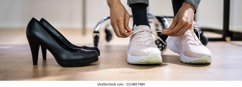 African American Woman Changing To Comfortable Sport Shoes - Powered by Shutterstock