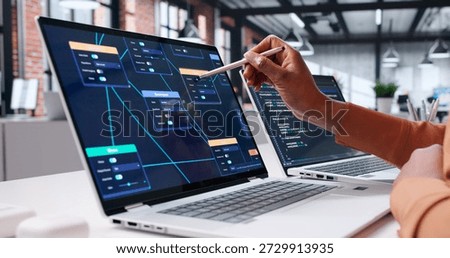 African American Woman Coding Node Editor Software For Blockchain Security.