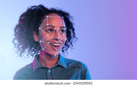 African American woman with curly hair is smiling as light patterns for facial recognition overlay her face. The vibrant background enhances the futuristic and engaging atmosphere of the moment. - Powered by Shutterstock