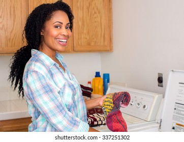 African American Woman Doing Laundry