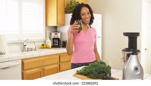 African American Woman Drinking Freshly Made Juice