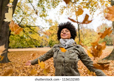 African American Woman Enjoying Autumn Season