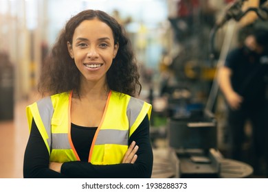 African American woman happy worker engineering working smile labor in heavy industry factory with good welfare concept.