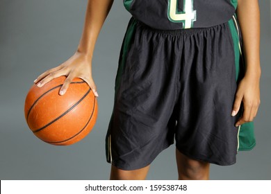 African American Woman Holding Basketball