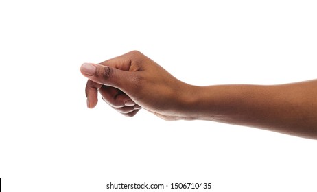 African american woman holding something in fist, ready to share, isolated on white background. Panorana with copy space - Powered by Shutterstock