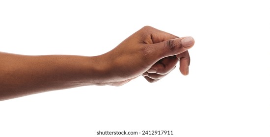 African american woman holding something in fist, ready to share, isolated on white background. Panorana with copy space - Powered by Shutterstock