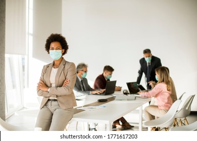 African American Woman In The Office Wear Mask As Protection From Corona Virus