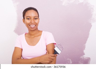 African American Woman Painting House