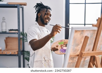 African american woman smiling confident drawing at art studio - Powered by Shutterstock