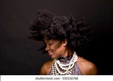 African American Woman Smiling And Dancing.