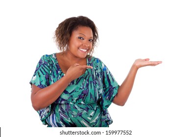 African American Woman Smiling Holding Something In Her Hand Palm, Over White Background - Black People