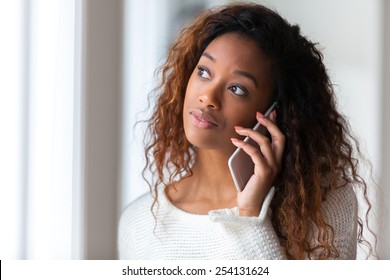 African American Woman Talking On A Mobile Phone - Black People