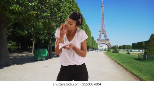 African American Woman Traveling In Paris Eats Cheesy Slice Of Pizza For Lunch