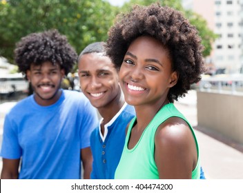 African American Woman With Two Friends In The City