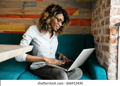african american woman using laptop