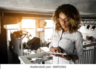 African American Woman Using Tablet