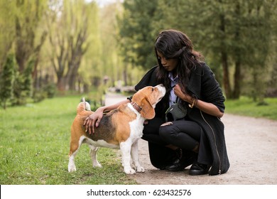 African American Woman Walking Dog