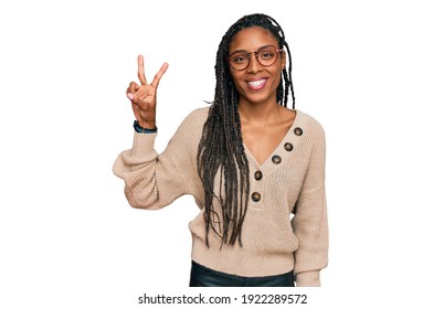 African American Woman Wearing Casual Clothes Showing And Pointing Up With Fingers Number Two While Smiling Confident And Happy. 