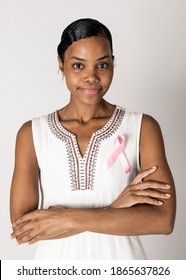 African American Woman Wearing A Pink Ribbon For Brest Cancer Awareness