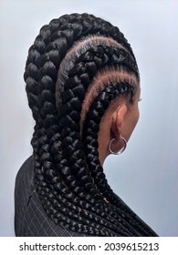 African American Women With Hair Braided Into A Cornrow Hairstyle Using Synthetic Hair Extensions