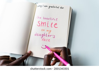 African American Women Writing In Gratitude Journal