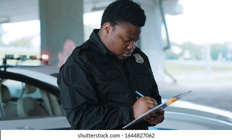 African American Young Man Cops Stand Near Patrol Car Write Enforcement Happy Officer Police Uniform Auto Safety Security Communication Control Policeman Close Up Slow Motion